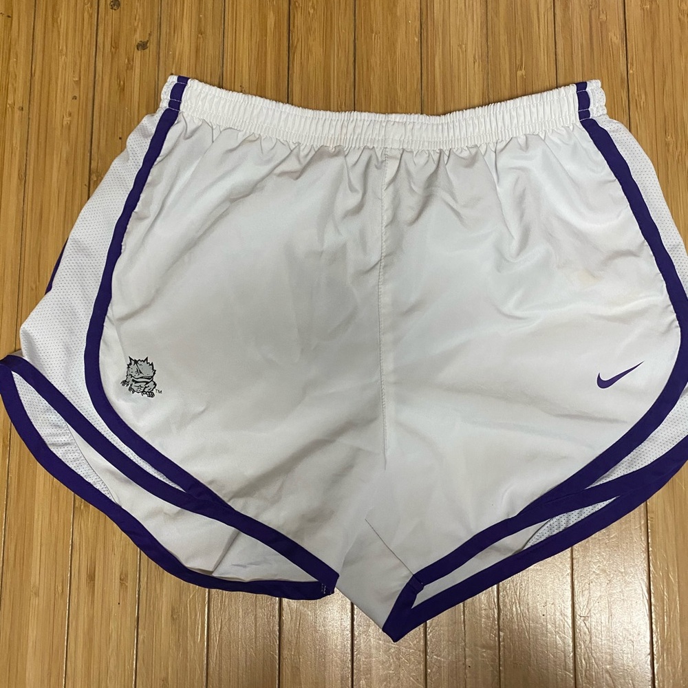 White and purple athletic shorts